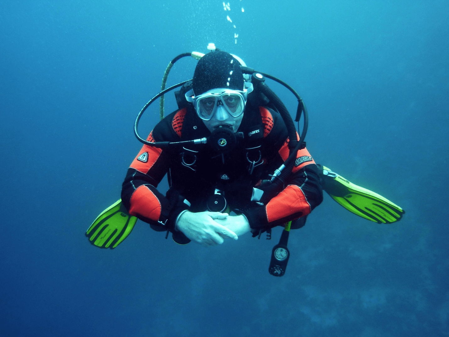 A person scuba diving.