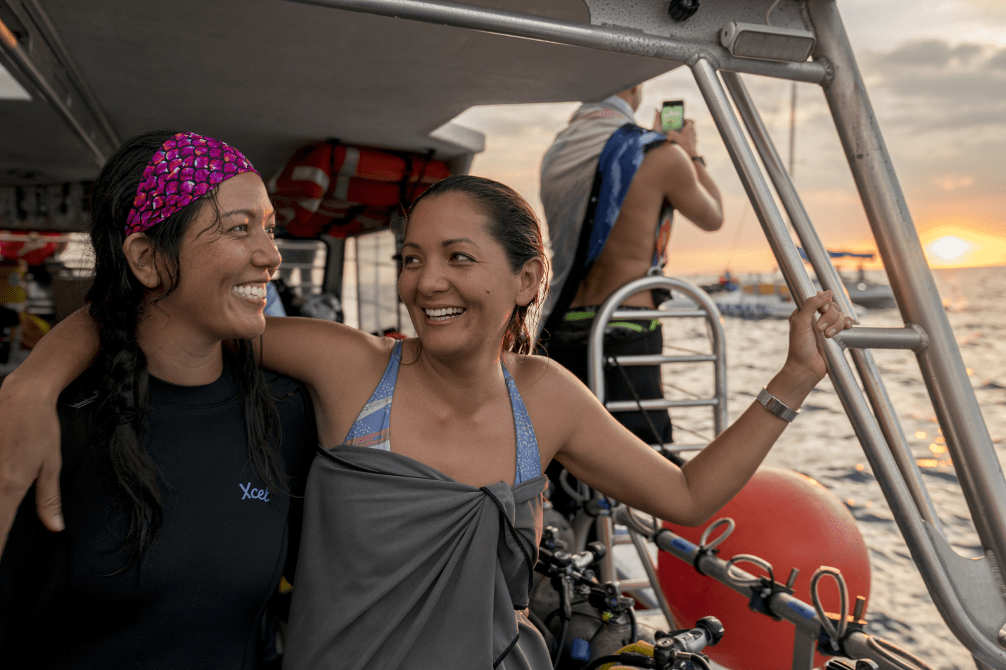 divers on a boat